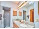 Bright bathroom features double sink granite vanity and a tiled walk-in shower at 37 Wedgewood Rd, Chapel Hill, NC 27514