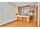 Bright hallway with view into kitchen and bar area at 37 Wedgewood Rd, Chapel Hill, NC 27514