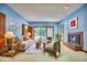 Spacious living room features a stone fireplace, neutral tones, and natural lighting at 37 Wedgewood Rd, Chapel Hill, NC 27514