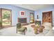 Inviting living room features a cozy fireplace, built-in bookshelves, and bright windows at 37 Wedgewood Rd, Chapel Hill, NC 27514