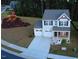 Beautiful two-story home with an attached two-car garage and a community playground in sight at 391 Curling Creek Dr Dr, Clayton, NC 27527