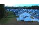 Exterior shot of light blue home in a quiet neighborhood. Well maintained backyard at 391 Curling Creek Dr Dr, Clayton, NC 27527