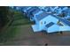 Exterior of light blue home with a large backyard in a quiet neighborhood at 391 Curling Creek Dr Dr, Clayton, NC 27527