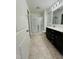 Bathroom featuring a shower with sliding doors and a vanity at 391 Curling Creek Dr Dr, Clayton, NC 27527