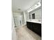 Bathroom with double sinks, shower, and a modern vanity at 391 Curling Creek Dr Dr, Clayton, NC 27527