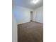 Bedroom showcasing neutral carpet, a window, and a closet at 391 Curling Creek Dr Dr, Clayton, NC 27527