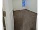 This bedroom features neutral carpet and a window with a view at 391 Curling Creek Dr Dr, Clayton, NC 27527