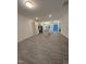 Spacious open-concept living area with modern kitchen, wood-look floors, and neutral paint tones at 391 Curling Creek Dr Dr, Clayton, NC 27527