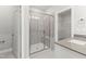 Modern bathroom boasts a glass-enclosed shower, sleek fixtures, and access to a walk-in closet at 40 W Victoria Ridge Dr # 18, Selma, NC 27576