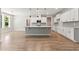 Stylish kitchen features an island, pendant lighting, and stainless steel appliances at 40 W Victoria Ridge Dr # 18, Selma, NC 27576