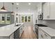 Bright kitchen showcasing a spacious island, stainless steel appliances, and ample natural light at 40 W Victoria Ridge Dr # 18, Selma, NC 27576