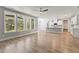 Bright open-concept living space transitions into a modern kitchen with natural light at 40 W Victoria Ridge Dr # 18, Selma, NC 27576