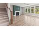 Bright living room features a modern fireplace, ceiling fan and multiple windows at 40 W Victoria Ridge Dr # 18, Selma, NC 27576