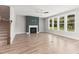 Bright living room features a modern fireplace, ceiling fan and multiple windows at 40 W Victoria Ridge Dr # 18, Selma, NC 27576