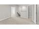 Loft/hallway space providing access to rooms, carpeted and with neutral walls at 40 W Victoria Ridge Dr # 18, Selma, NC 27576