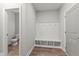 Mudroom with storage and bench, providing a functional space for coats, shoes, and accessories at 40 W Victoria Ridge Dr # 18, Selma, NC 27576