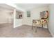 Open basement space featuring a pinball machine and view of the built-in shelves at 421 Ridgefield Rd Rd, Chapel Hill, NC 27517