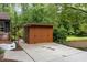 Spacious shed with a covered area, offering ample storage and parking on a concrete pad at 421 Ridgefield Rd Rd, Chapel Hill, NC 27517