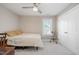 Simple bedroom with a bed, ceiling fan, closet, and window with natural light at 45 Leighann S Ct, Timberlake, NC 27583