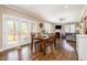 Cozy dining area with natural light and French door access to the outdoor deck, open to the living area at 45 Leighann S Ct, Timberlake, NC 27583