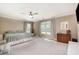Spacious primary bedroom featuring neutral tones, plush carpeting, and abundant natural light at 45 Leighann S Ct, Timberlake, NC 27583
