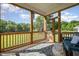 Relaxing screened-in porch with seating area and a beautiful view of the backyard at 45 Leighann S Ct, Timberlake, NC 27583