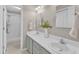 Double vanity bathroom with walk-in shower at 4533 Whistling Way, Raleigh, NC 27616