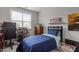 Bedroom featuring a desk, a dresser and bed with blue bedding at 4562 Brighton Ridge Dr, Apex, NC 27539