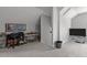 Spacious room with vaulted ceilings, carpet flooring, and storage shelves along the walls at 4562 Brighton Ridge Dr, Apex, NC 27539