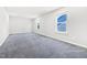 Spacious bonus room with carpet, recessed lighting, and large windows offering natural light at 4601 Okeechobee Ct, Fuquay Varina, NC 27526