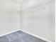 Empty closet featuring gray carpet and wire shelves at 4601 Okeechobee Ct, Fuquay Varina, NC 27526