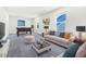 Entertainment room with pool table, sofa, ottoman, and natural light at 4601 Okeechobee Ct, Fuquay Varina, NC 27526