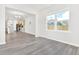 Open floor plan with a living area and a view of the kitchen, highlighting the spacious layout at 4601 Okeechobee Ct, Fuquay Varina, NC 27526
