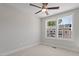 Bright bedroom with large windows, offering a view of the neighborhood at 509 Sherron Rd # 11, Durham, NC 27703