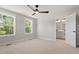 Bright bedroom with windows overlooking the yard and an en-suite bathroom at 509 Sherron Rd # 11, Durham, NC 27703