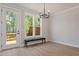 Bright dining area with natural light from large windows and access to an outdoor space at 509 Sherron Rd # 11, Durham, NC 27703