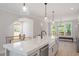 Stylish kitchen with stainless steel appliances, a kitchen island, and eat-in counter at 509 Sherron Rd # 11, Durham, NC 27703