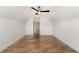 Bedroom with hardwood floors and a ceiling fan at 5180 Old Powell Rd, Holly Springs, NC 27540