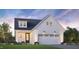 Charming new construction featuring white brick and siding, a two-car garage, and a welcoming front yard at 5217 Bowes Meadow Ct # 14, Raleigh, NC 27610