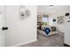 Bright bedroom featuring playful decor, a patterned bedspread, and a sunlit window at 55 E American Marigold Dr # 36, Benson, NC 27504