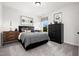 Cozy bedroom with a well-dressed bed, contemporary decor, and soft, neutral tones at 55 E American Marigold Dr # 36, Benson, NC 27504