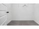 Walk-in closet with carpet flooring and wire shelving at 55 E American Marigold Dr # 36, Benson, NC 27504