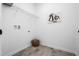 Bright laundry room with wire shelving, tile floors, and convenient washer/dryer hookups at 55 E American Marigold Dr # 36, Benson, NC 27504