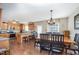 Open-concept kitchen and dining area with granite countertops and stainless steel appliances at 59 Long Grass Dr, Smithfield, NC 27577