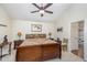 Comfortable bedroom features a ceiling fan and a warm, inviting atmosphere at 59 Long Grass Dr, Smithfield, NC 27577