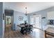 Bright dining area with chandelier and french doors leading to the backyard at 5912 Mt Zion Rd, Snow Camp, NC 27349