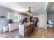 Spacious kitchen boasts island with seating, granite counters, and stainless steel appliances at 5912 Mt Zion Rd, Snow Camp, NC 27349