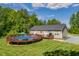 Above-ground pool, surrounded by a deck, offers a private backyard oasis for relaxation at 5912 Mt Zion Rd, Snow Camp, NC 27349