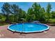 Inviting in-ground pool with surrounding wooden deck perfect for outdoor entertaining at 5912 Mt Zion Rd, Snow Camp, NC 27349