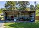 Open storage shed filled with yard equipment and tools, ready for outdoor projects at 5912 Mt Zion Rd, Snow Camp, NC 27349
